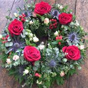 Funeral Flowers - Red rose and blue thistle wreath