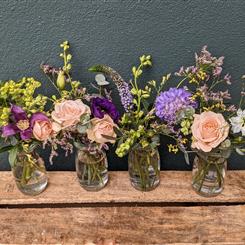 Flowers in Dinky Milk Bottles