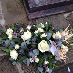Funeral Flowers -  A Beautiful Rose and Thistle Spray Single Ended